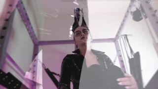 Fetish Mature Dominatrix Eva in Latex Vinyl pvc solo with glasses and heels