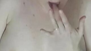 Mom playing with her big tits
