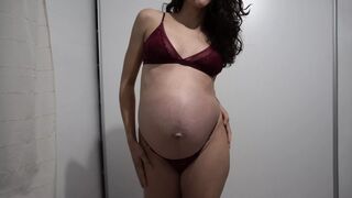 Pregnant Latina MILF trying on sexy lingerie