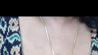 Indian bhabhi fondles her own boobs