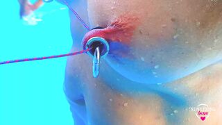 nippleringlover horny milf self nipple bondage in pool pierced nipples bound with string pulled hard