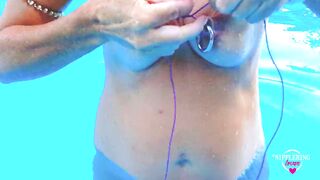 nippleringlover horny milf self nipple bondage in pool pierced nipples bound with string pulled hard