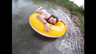Playing with a Water Donut Naked in the Lake