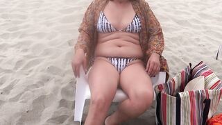 My beautiful 58-year-old wife shows off on the beach in a bikini