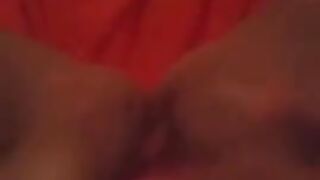 Masturbating