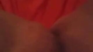 Masturbating