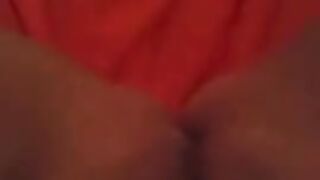 Masturbating