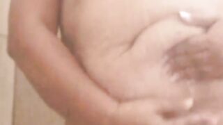 stepmom makes a call in the shower while daddy waits for her in the bedroom