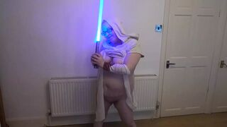 Rey Star Wars Cosplay with light sabre