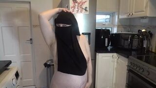 Dancing fully nude in Niqab