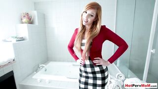 Busty redhead stepmom blows her stepson in the shower