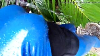 blue latex catsuit in my garden