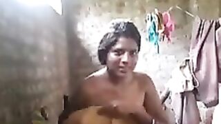 North indian housewife bathing