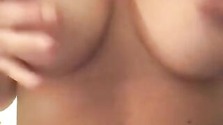 Slow-mo solo tit tease