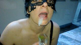 Hot milf sucks fat cock with artificial open mouth lips. After getting the sperm in her mouth, she plays with the cup.