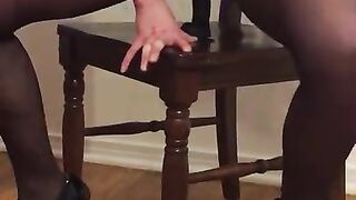 Liv, a black toy and a chair